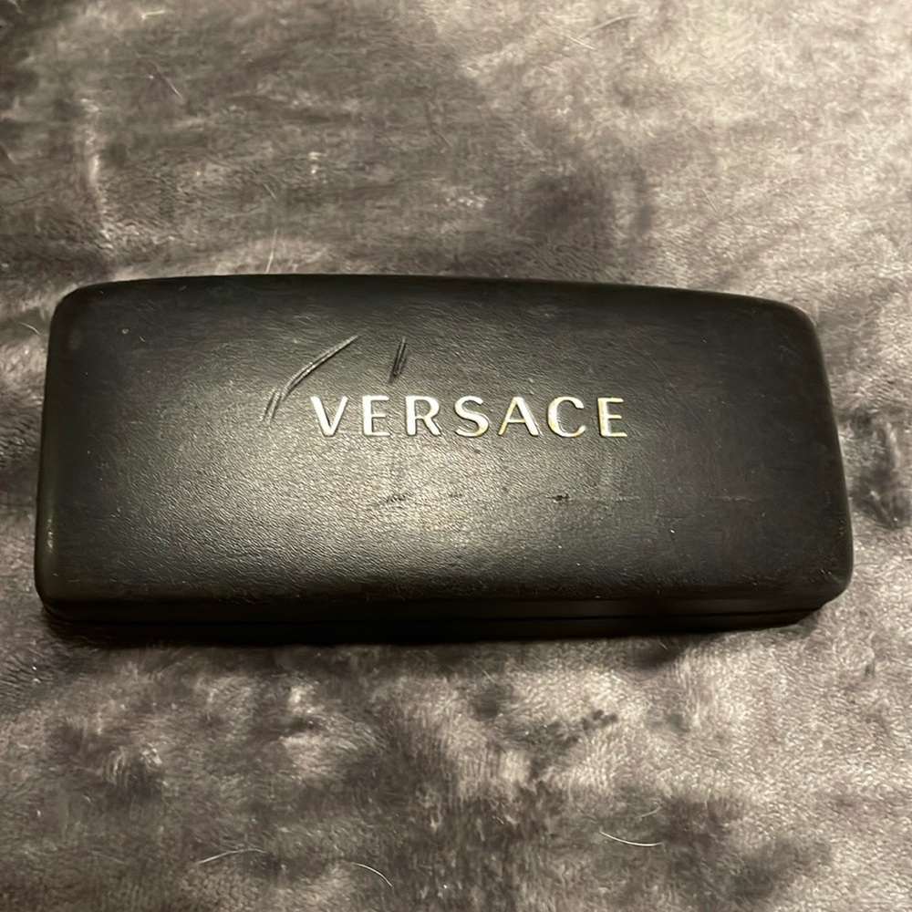 Versace hard glasses case- has some scratches on front & back, inside is good